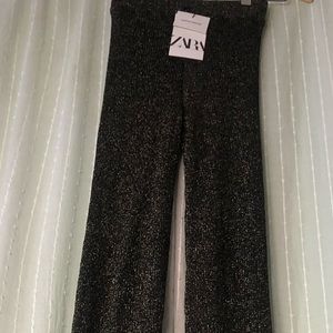 High waisted black and gold metallic knit pants